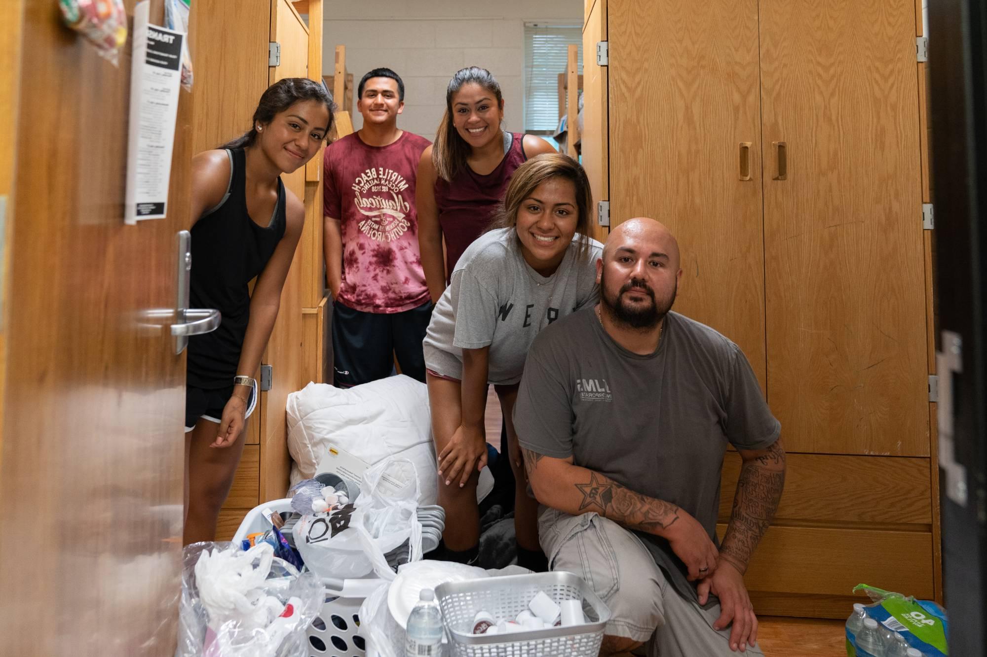 family in dorm room